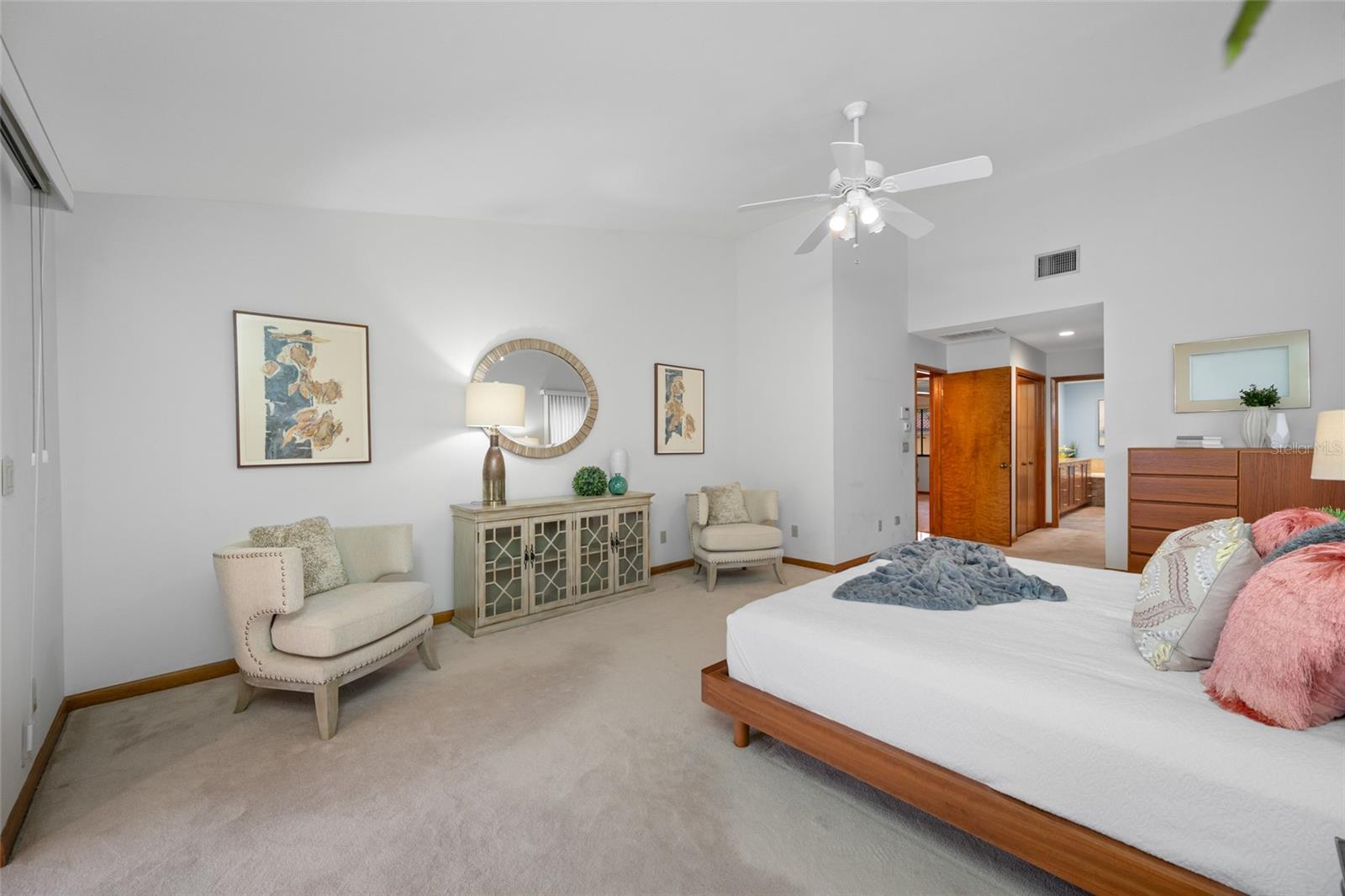 Primary bedroom suite with two closets