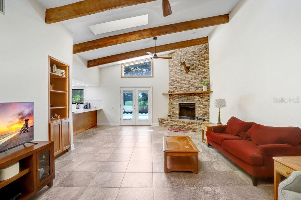 Family Room leading out to the Pool and connected to the REMODELED Kitchen