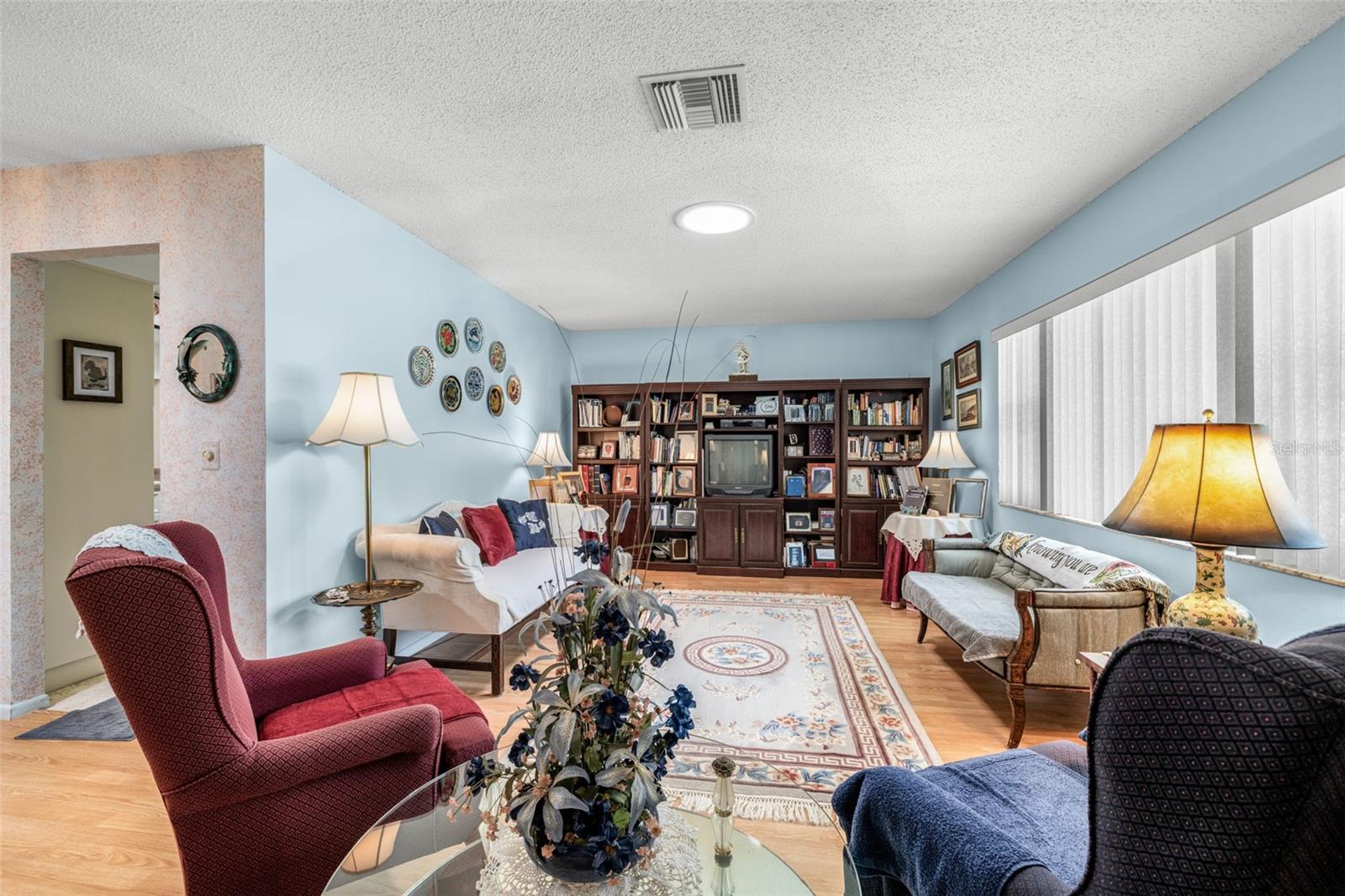 Immediately as you enter into this lovingly maintained home, you'll see how bright the home is with 3 solar tubes throughout the home!