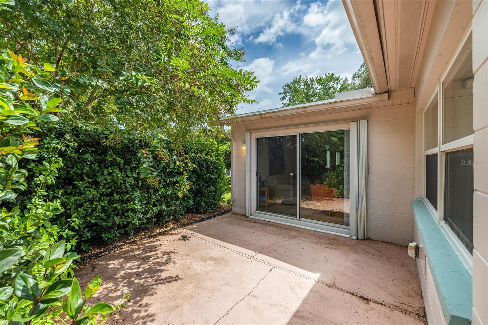Enjoy your private rear patio for a serene space to relax, BBQ or just enjoy the Florida sunshine!