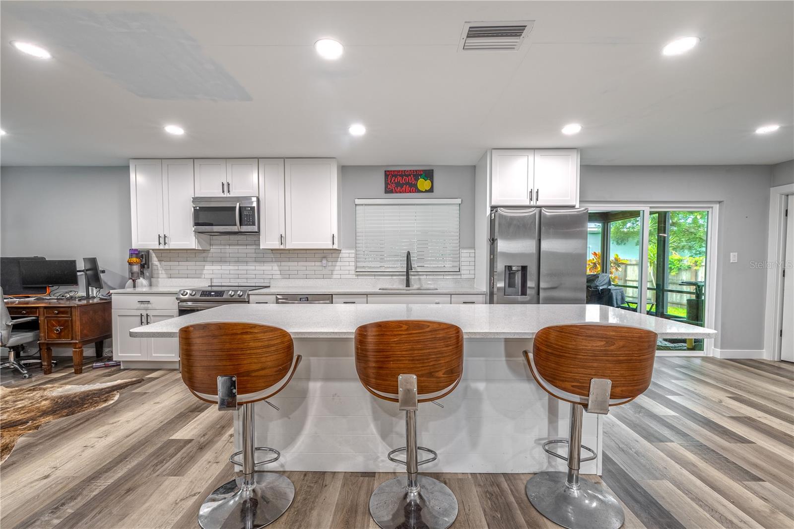 Kitchen island with bar seating, ideal for casual dining or entertaining guests.