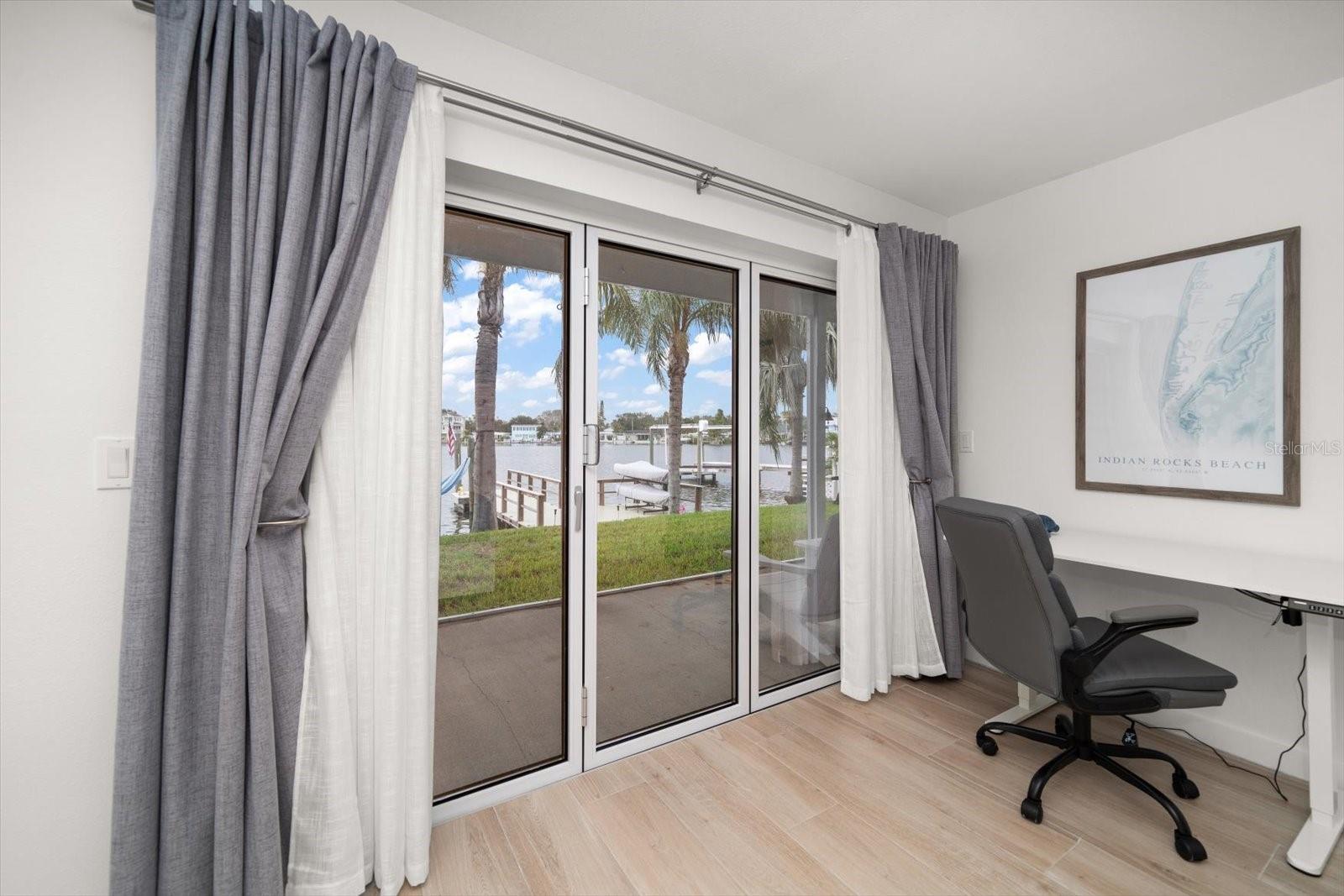 Additional office space or sitting area in the primary-love the views during those Zoom calls!