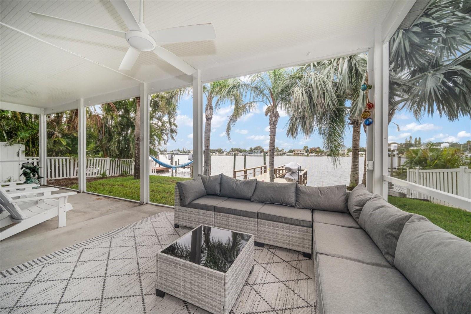 Oh what a view! Relaxing is a breeze in the large screened patio.