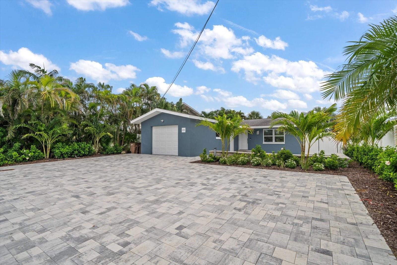 Worry free landscaping, ample room for up to 6 cars to park