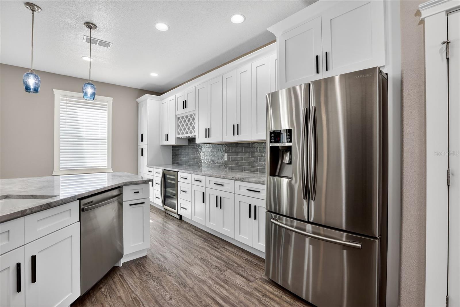 Chef's Kitchen with wine fridge / bar area