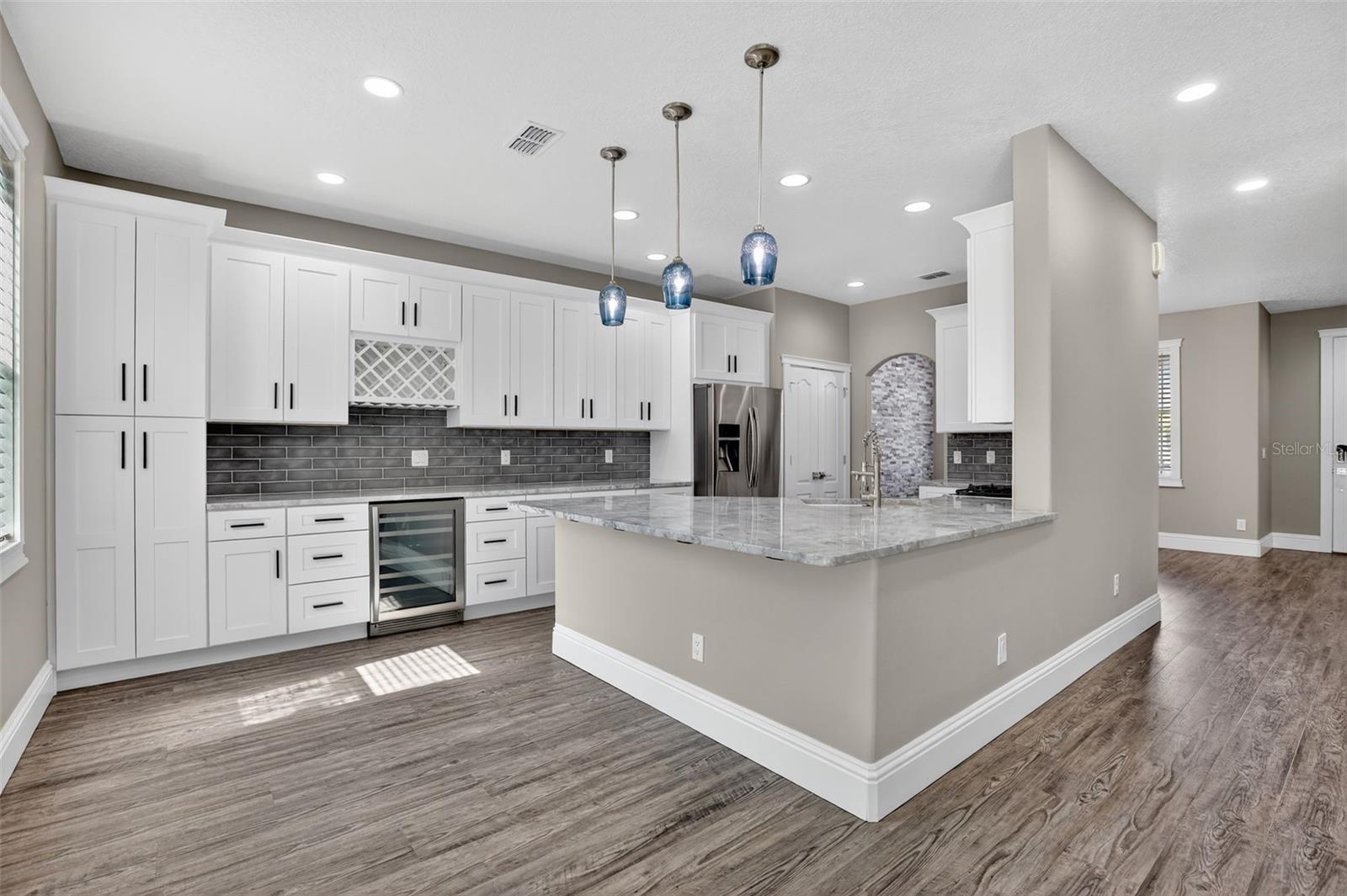 Tall cabinet for additional storage needs in this already large kitchen.