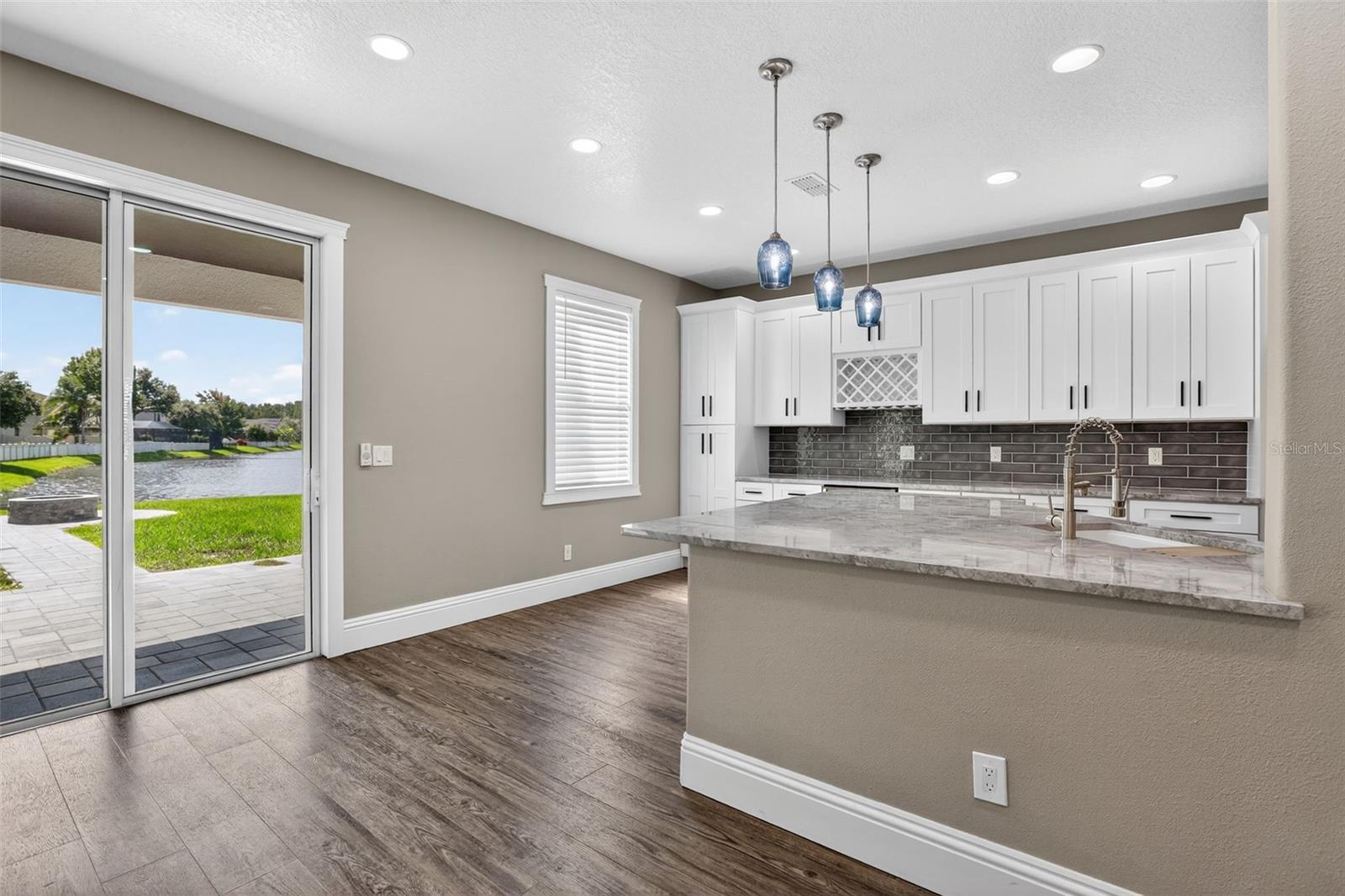 Neutral colors & seamless floors throughout the downstairs.