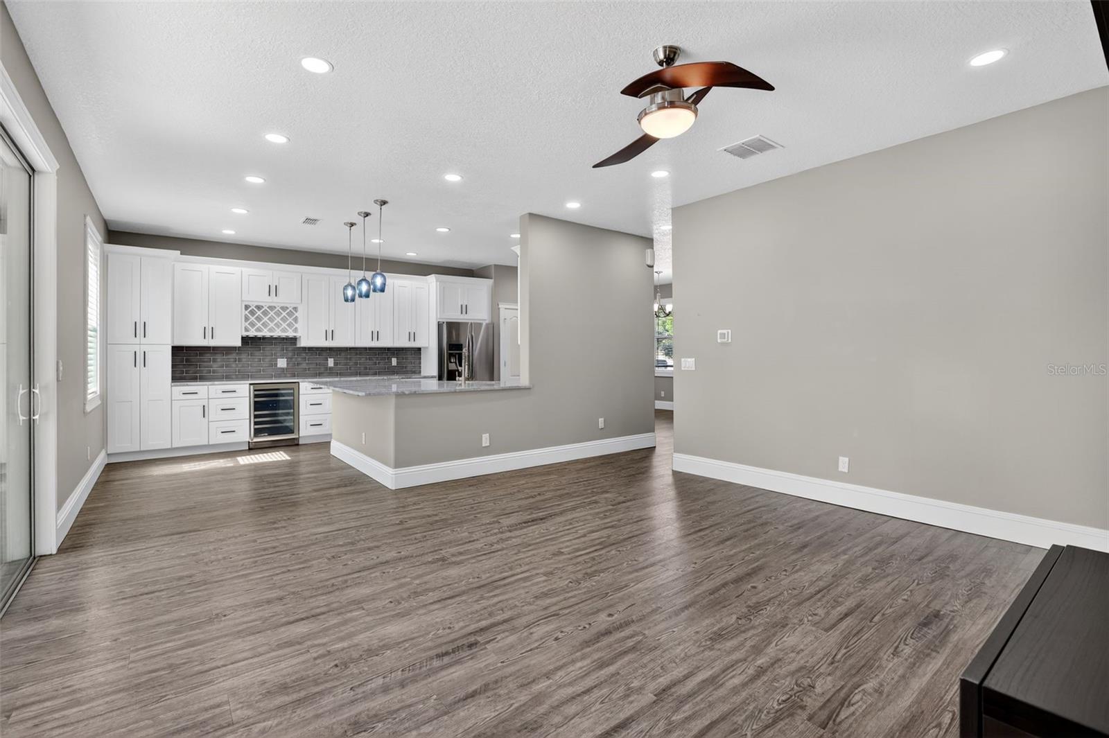 Living area with modern ceiling fan.
