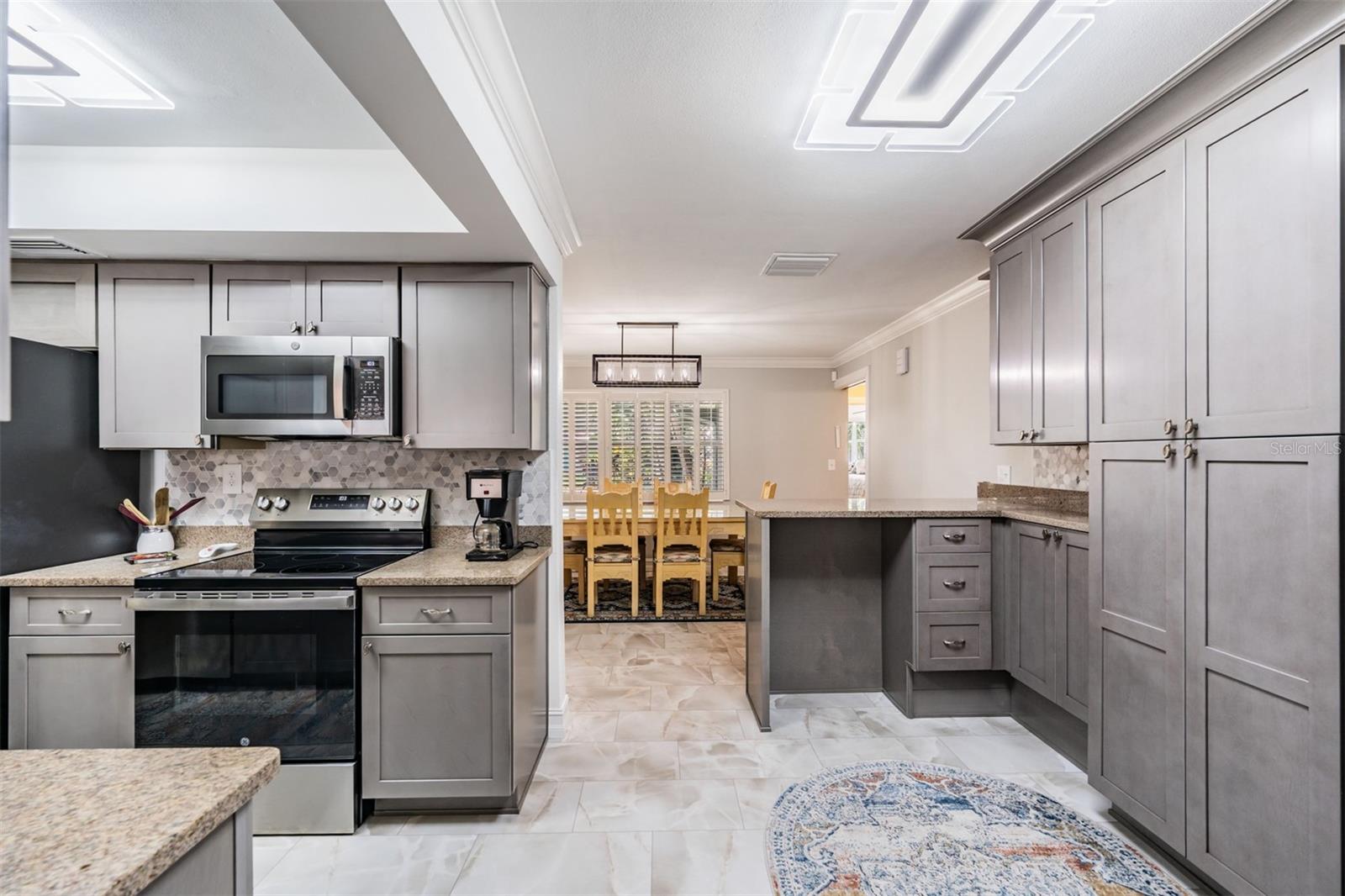 Counter area ready for a barstool could be a work area