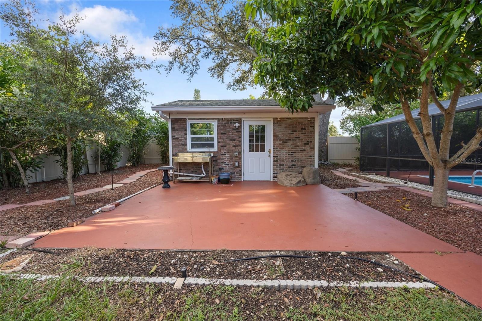Outside pool area- office, game room, lots of potential.