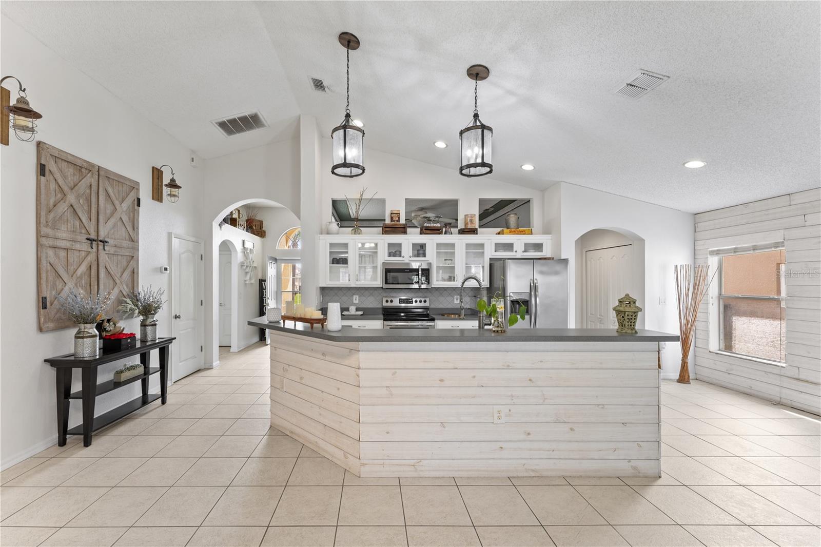Open Kitchen Left to the Foyer and Right to the Laundry and Garage