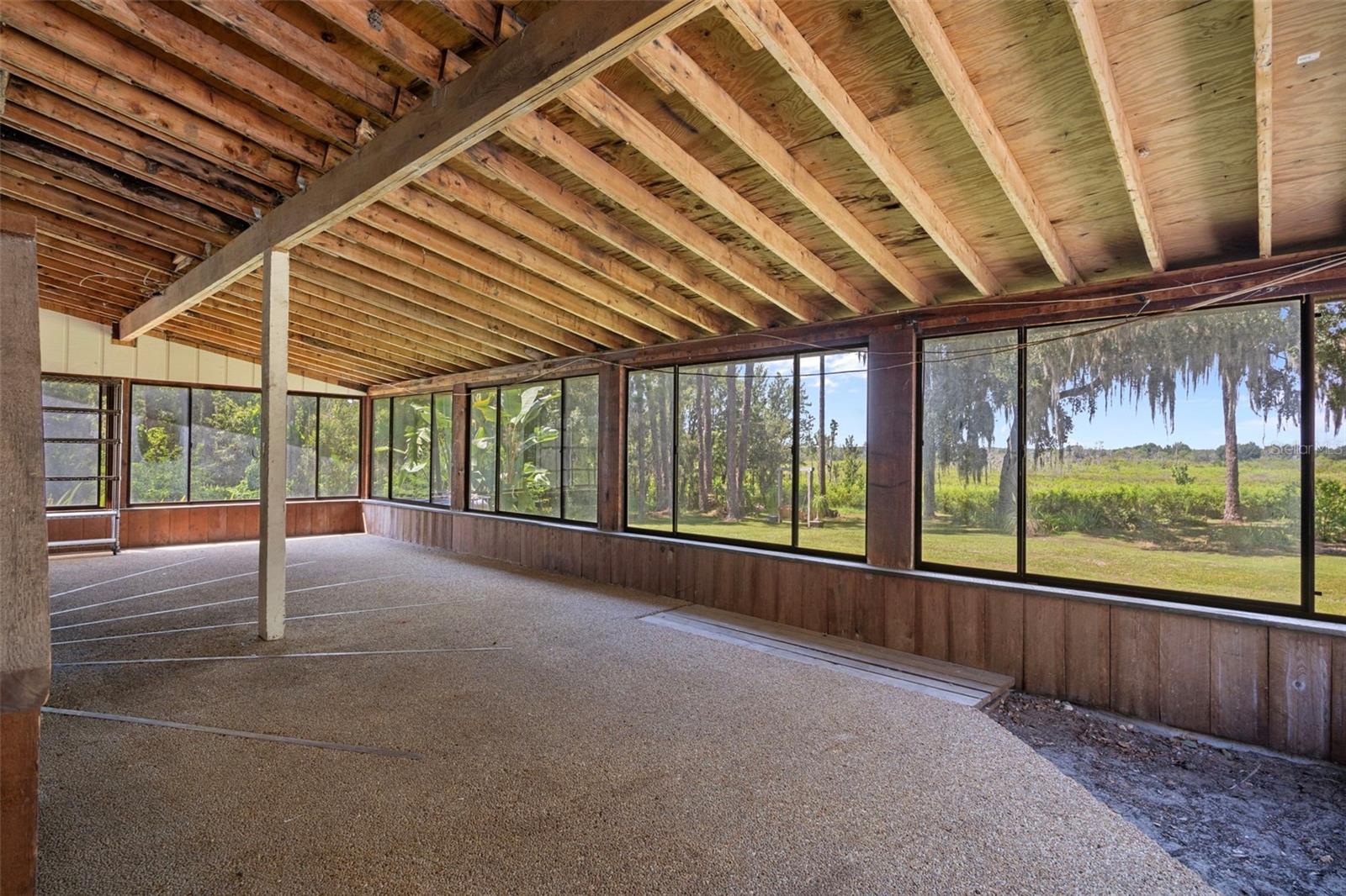 Back Glass Enclosed Patio Area