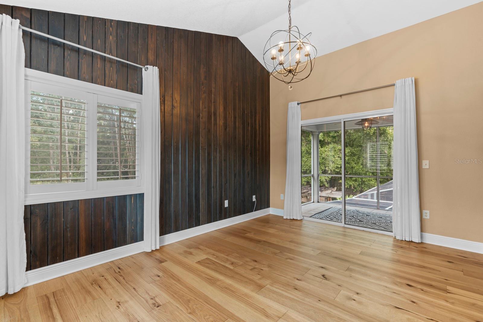 Primary Bedroom with private screened-in porch