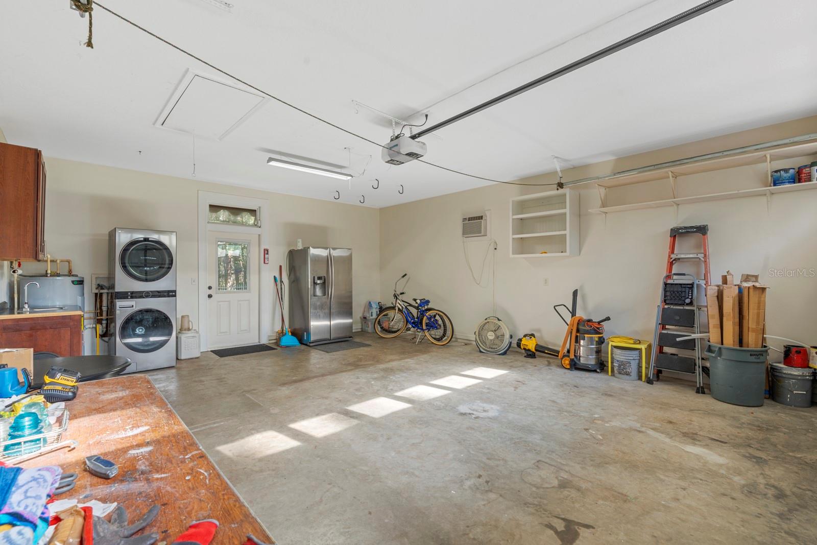 Oversized 2 car garage. The attic above plenty of storage space too.