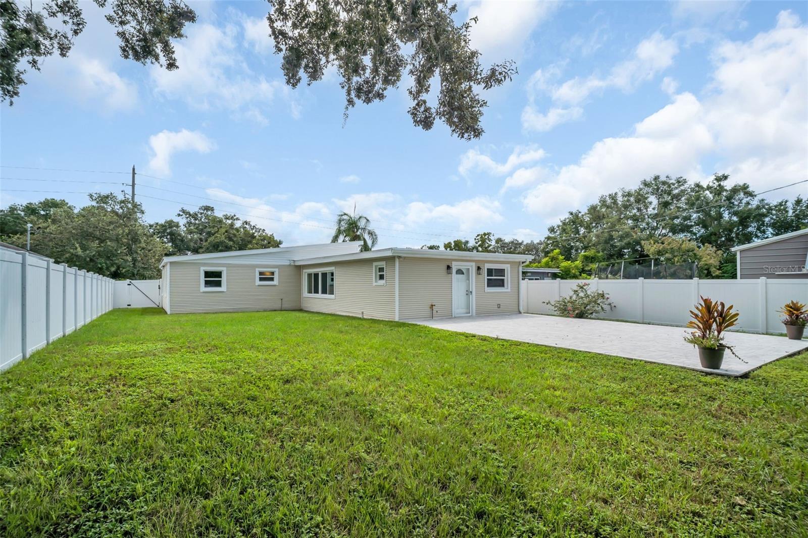 Rear of home, large patio, large yard