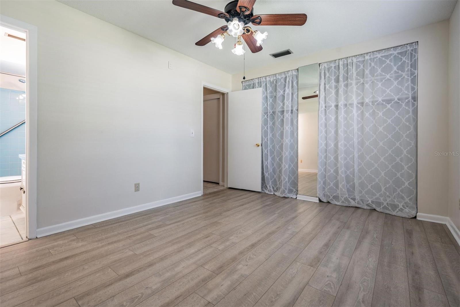 Two closets in the primary bedroom