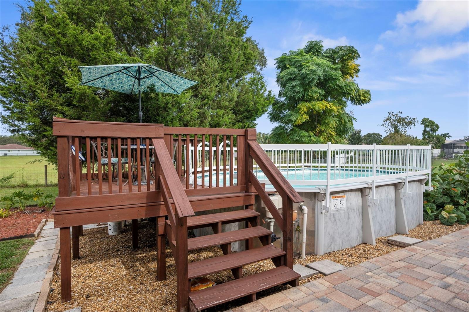 Above ground pool with deck