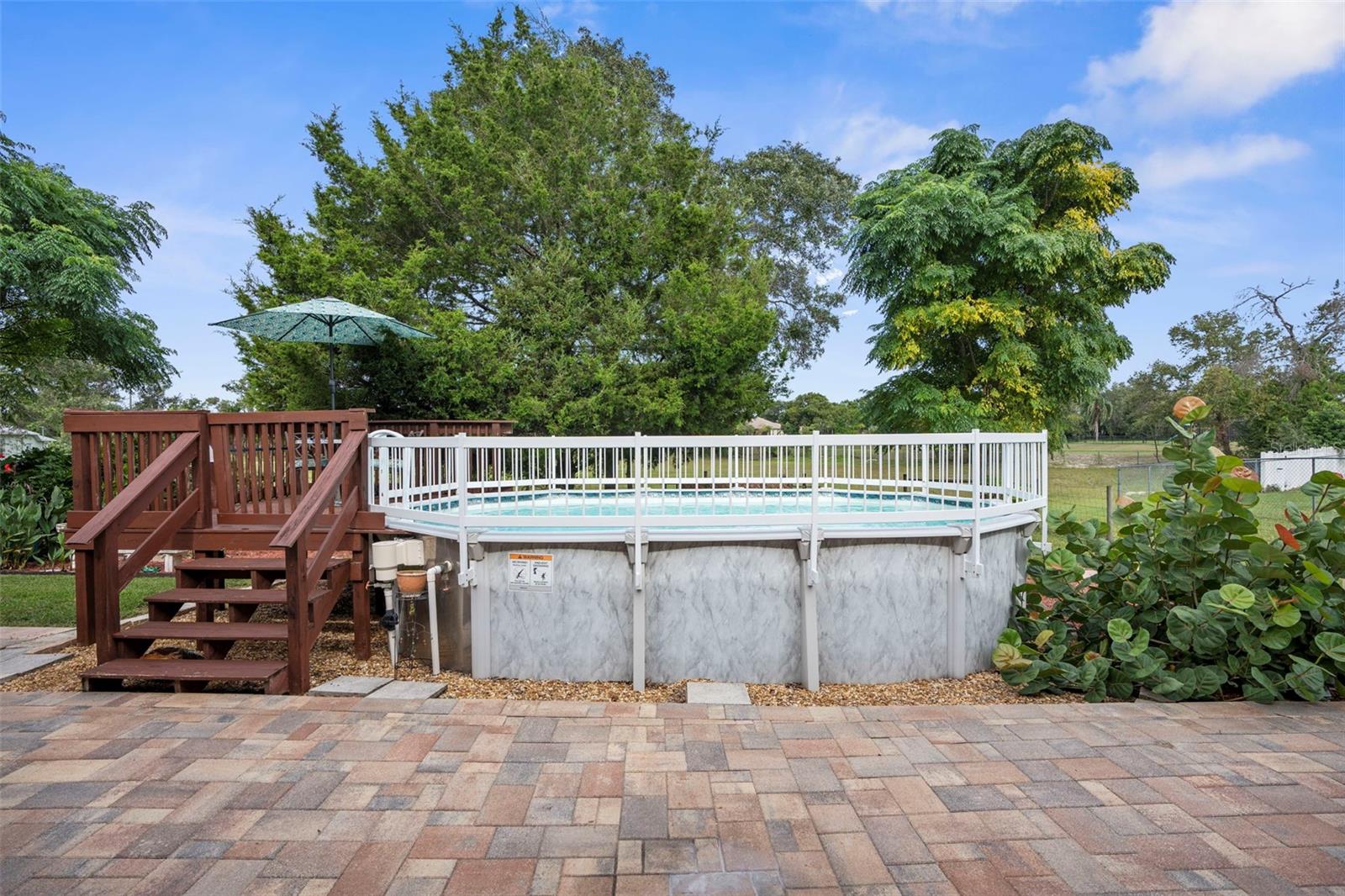 Above ground pool with deck