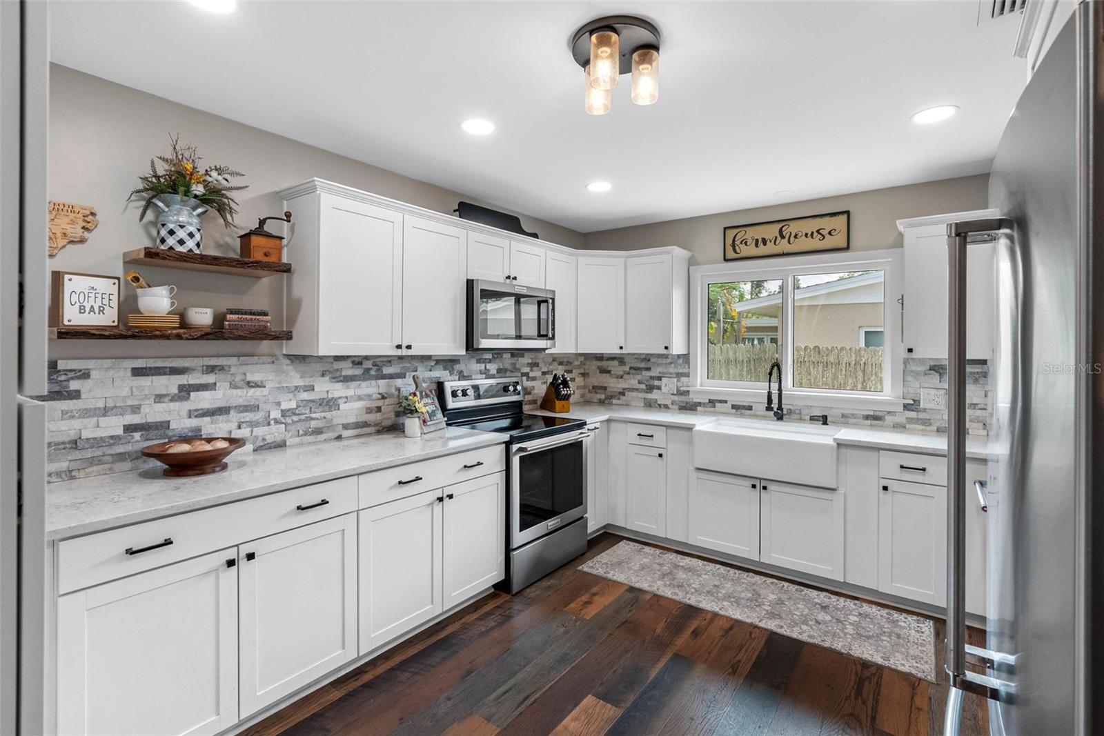 Quartz Countertops with Stone Backsplash
