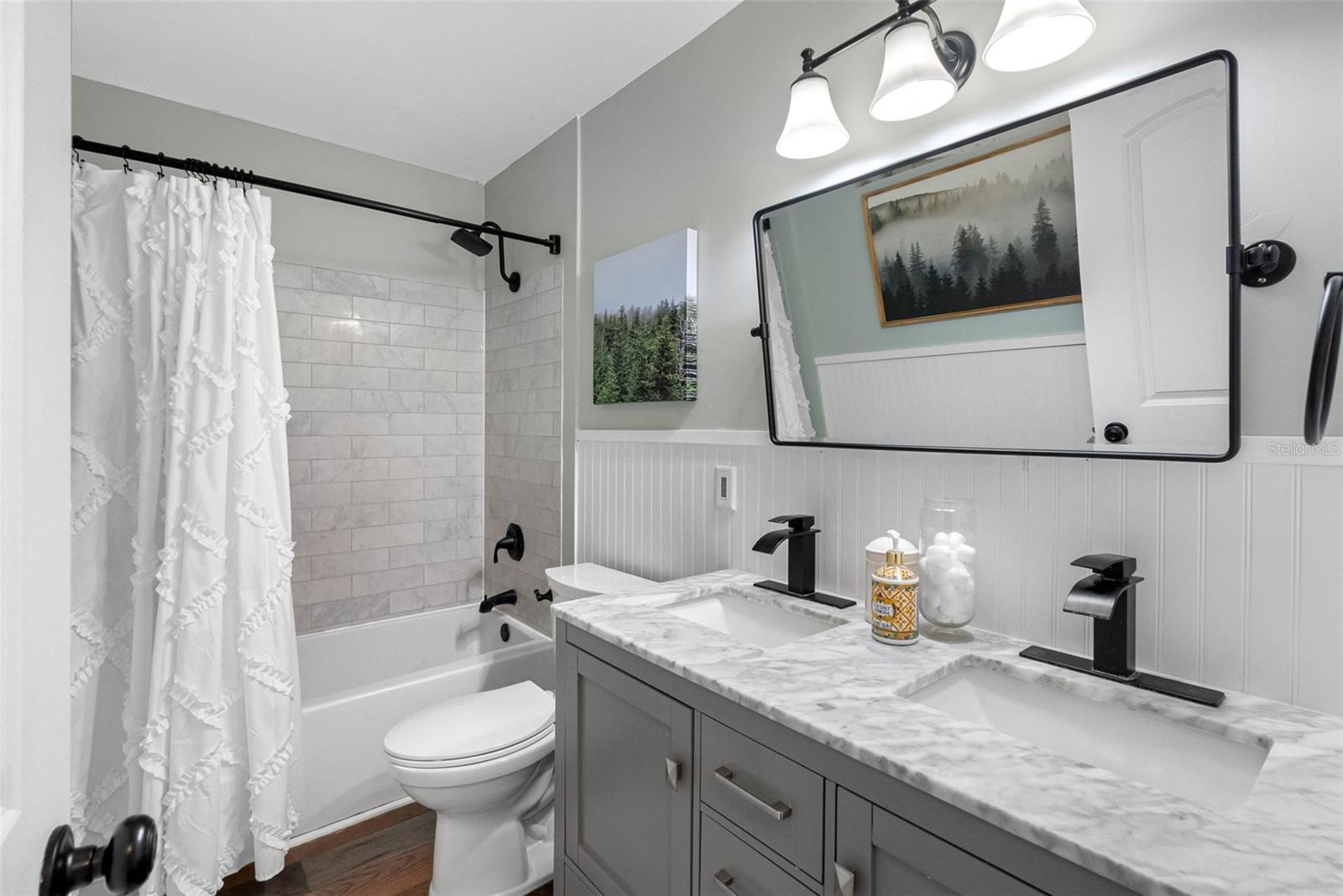 Updated Bath with Marble Vanity
