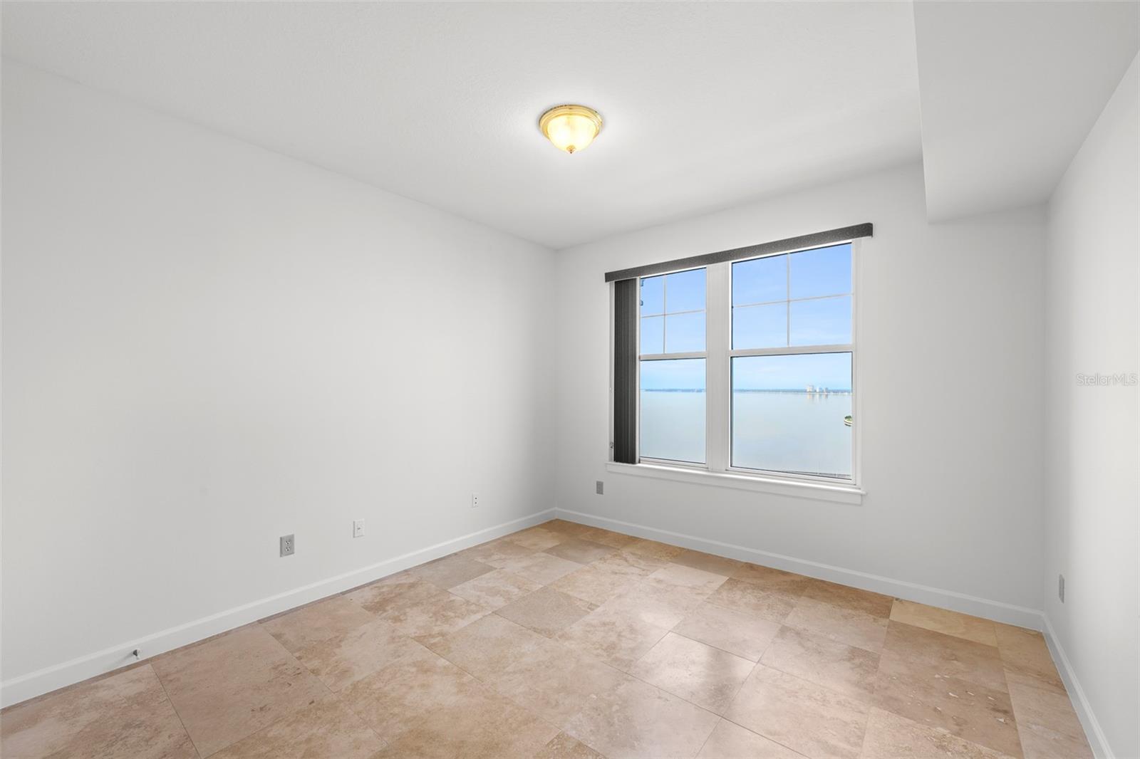 Primary Bedroom with Full Open Bay View and Partial City View