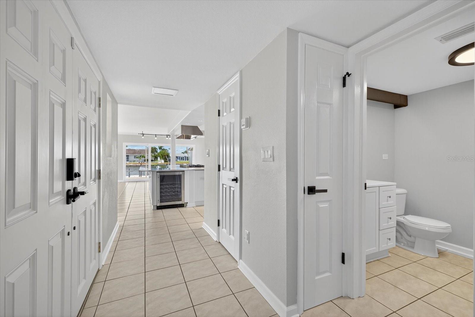 Front entry and guest bathroom on main floor
