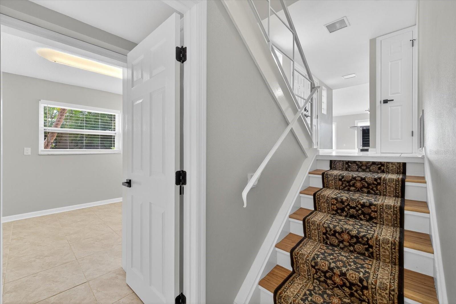 Stairs from lower level from garage to main floor