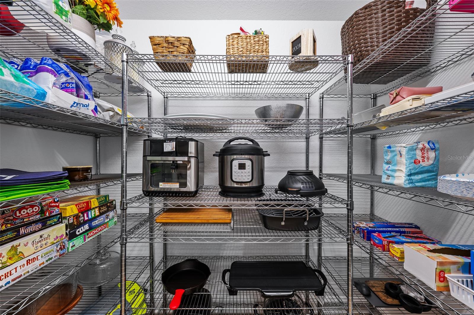Two pantries including this rare massive walk-in pantry