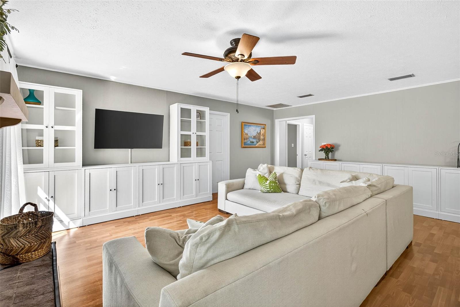 Living room--drawers and shelves convey