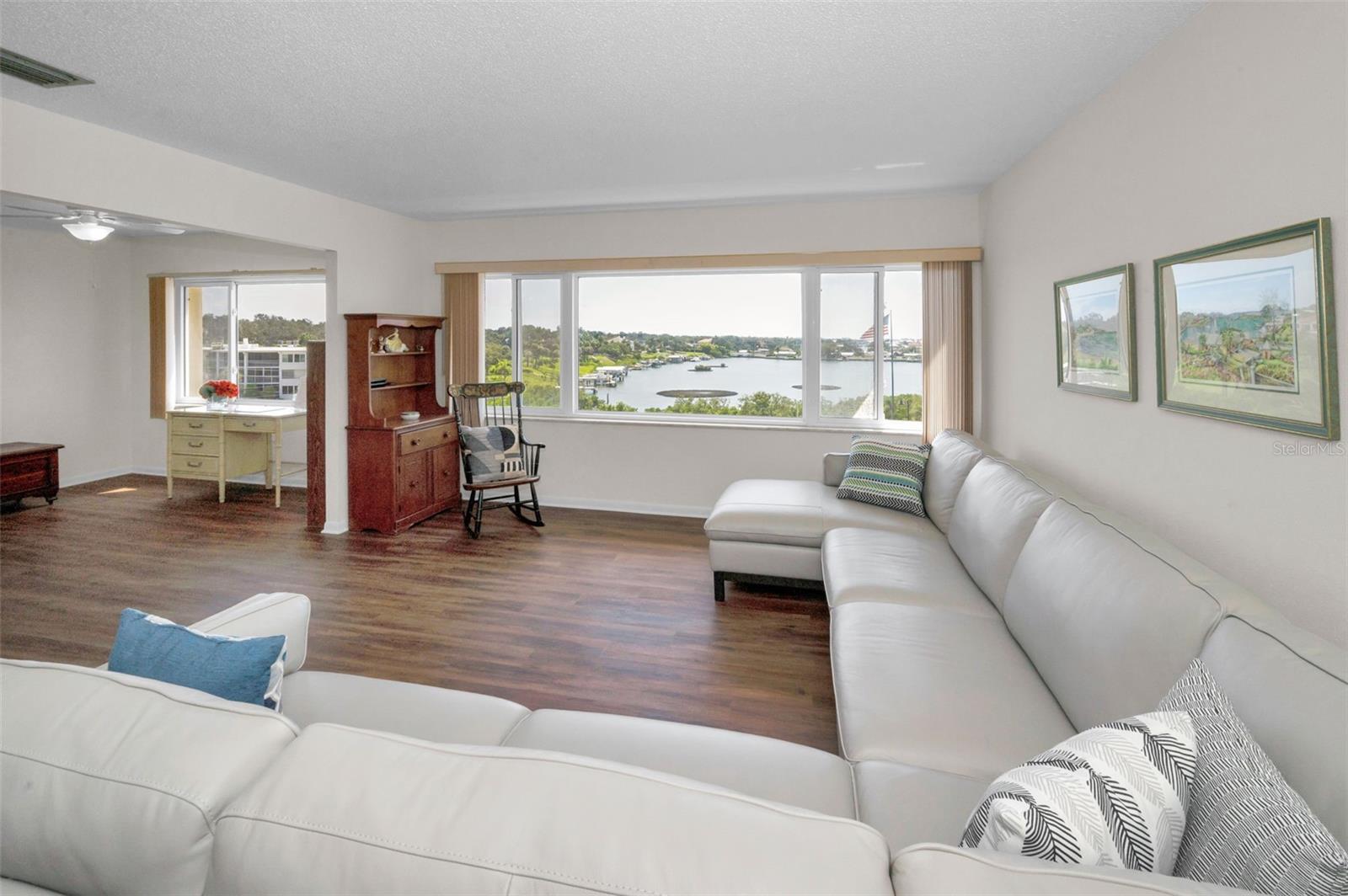 Open plan with view of office/den/Florida room