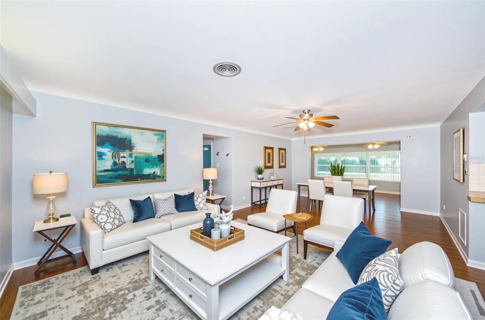 Living/dining area virtually staged
