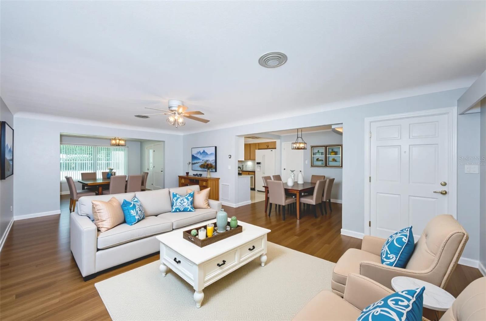 Living/dining area and dinette area virtually staged