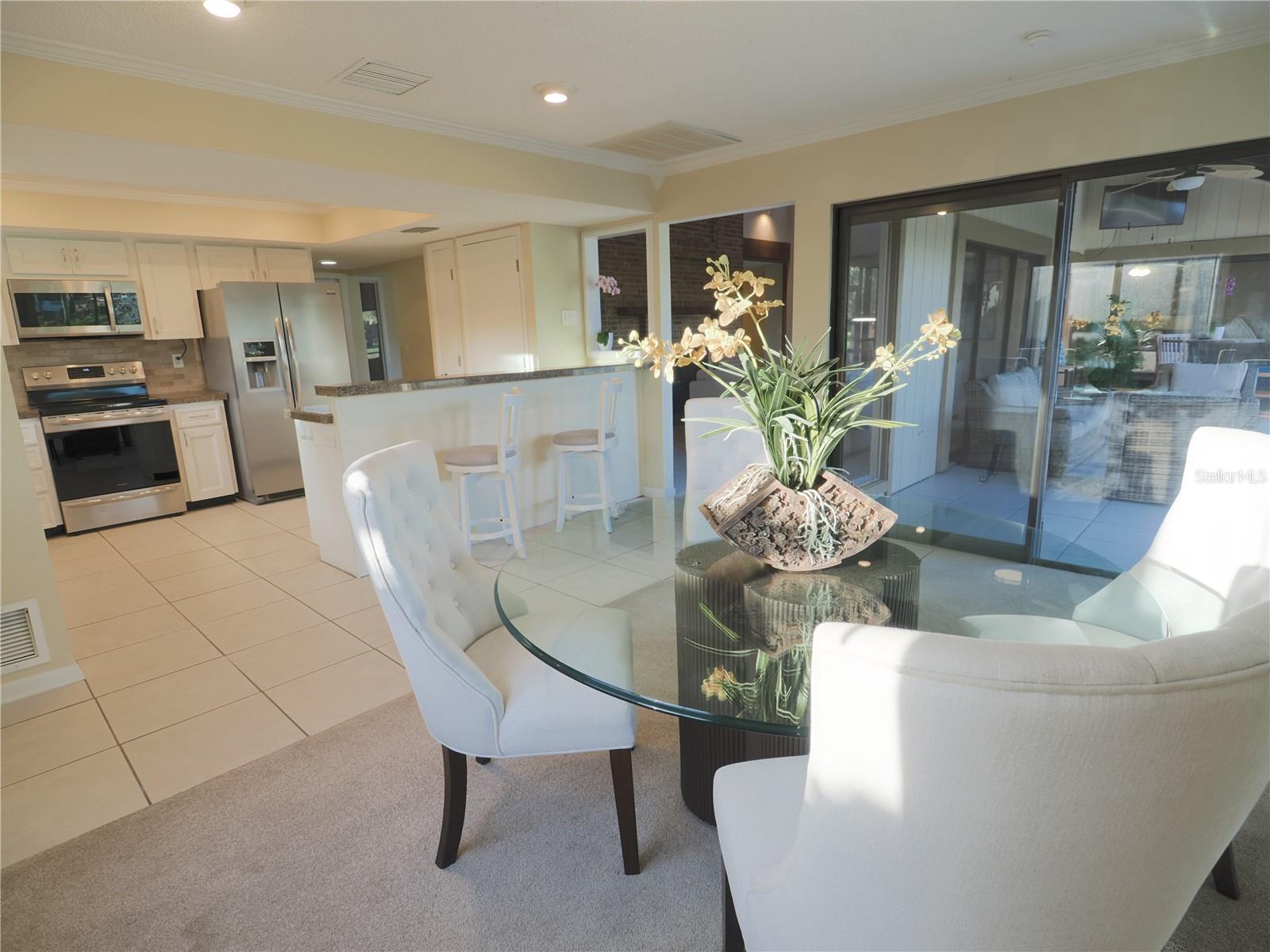 Sliders leading to lanai from dining room