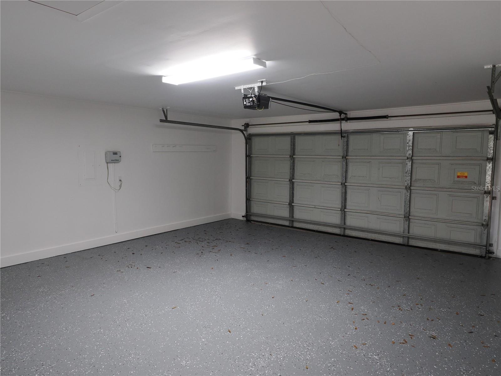 Double car garage newly painted with storage room