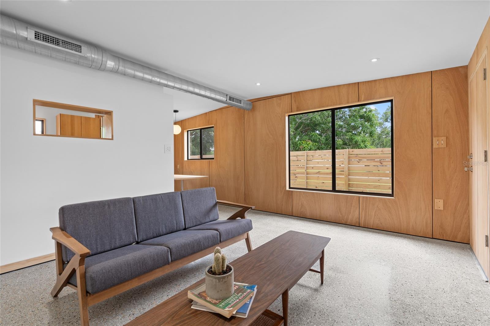 Open living space with lots of light and open kitchen concept.