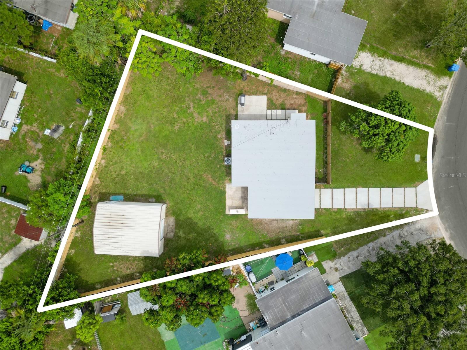 Located on an oversized lot with large shed/workshop area.