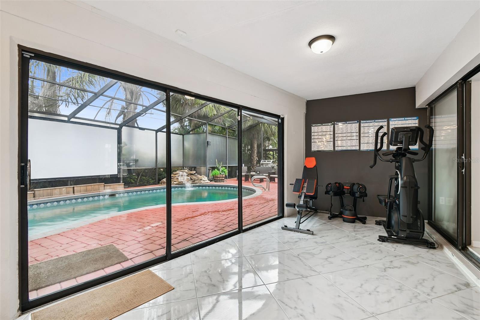 Florida Room with view of Pool Area