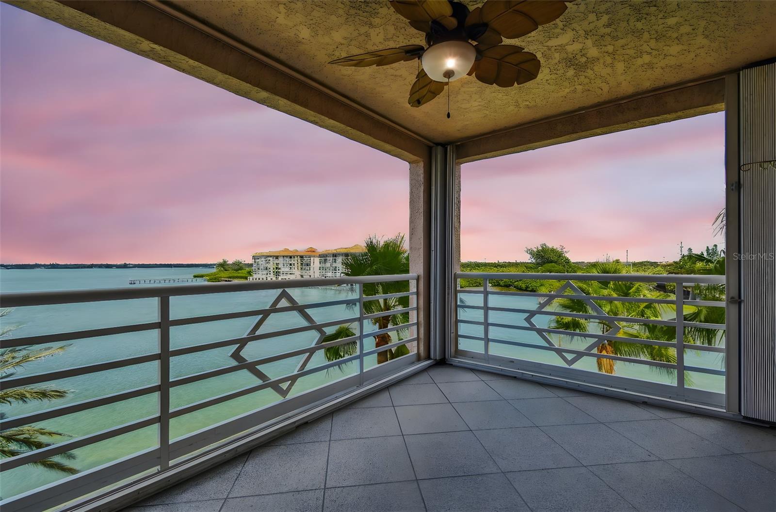 Gorgeous Evening Waterfront Views from This Elevated Corner Unit