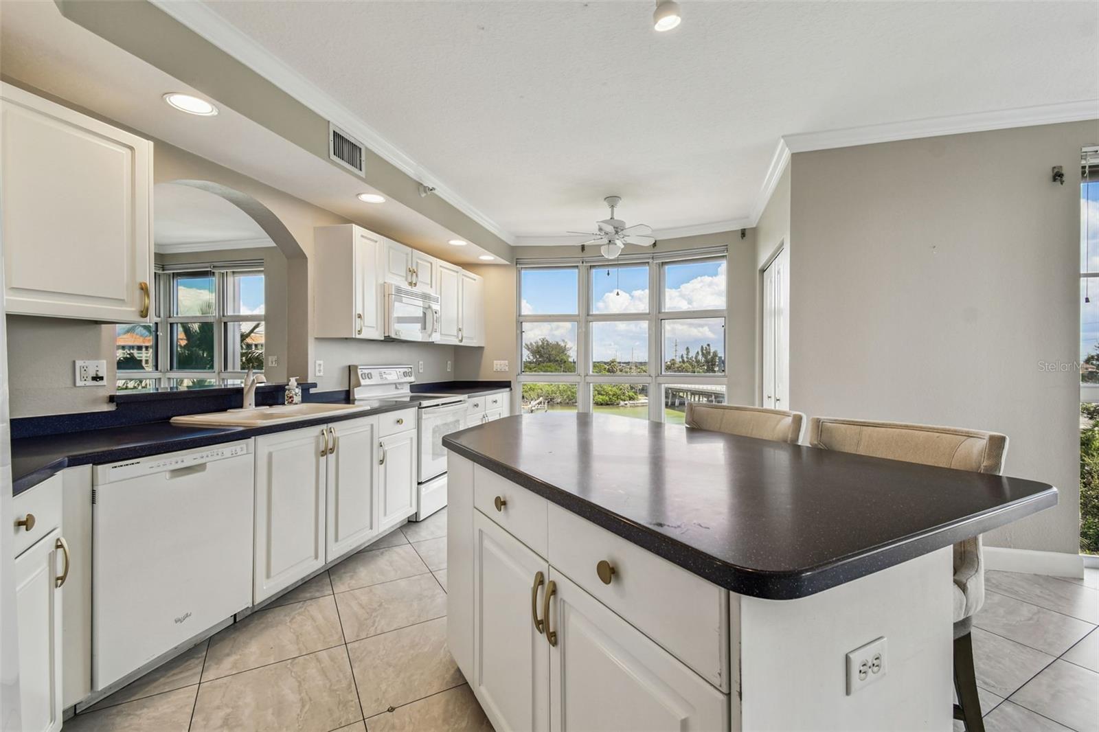 Handsome Kitchen with Large Central Breakfast Bar/Prep Space