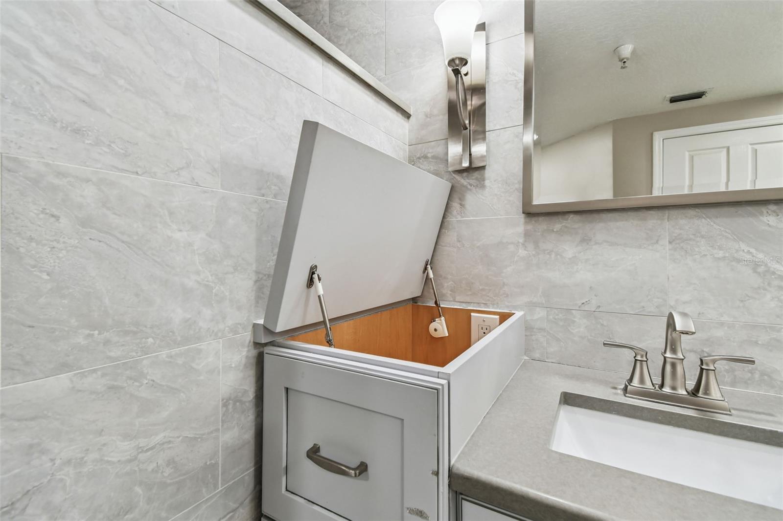 Built-in Storage Compartment with Electrical Outlets
