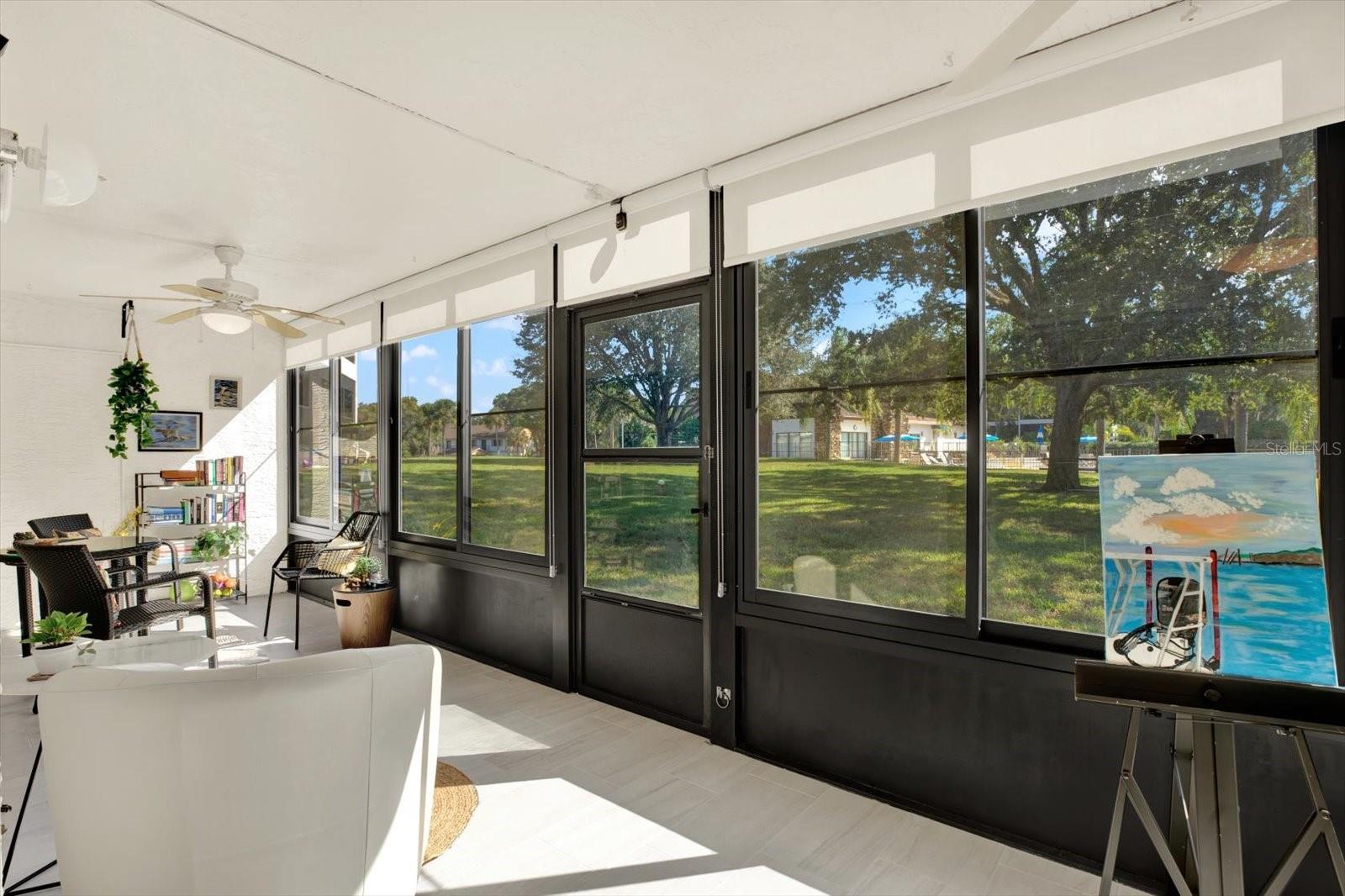 Florida room with pull-down shades.