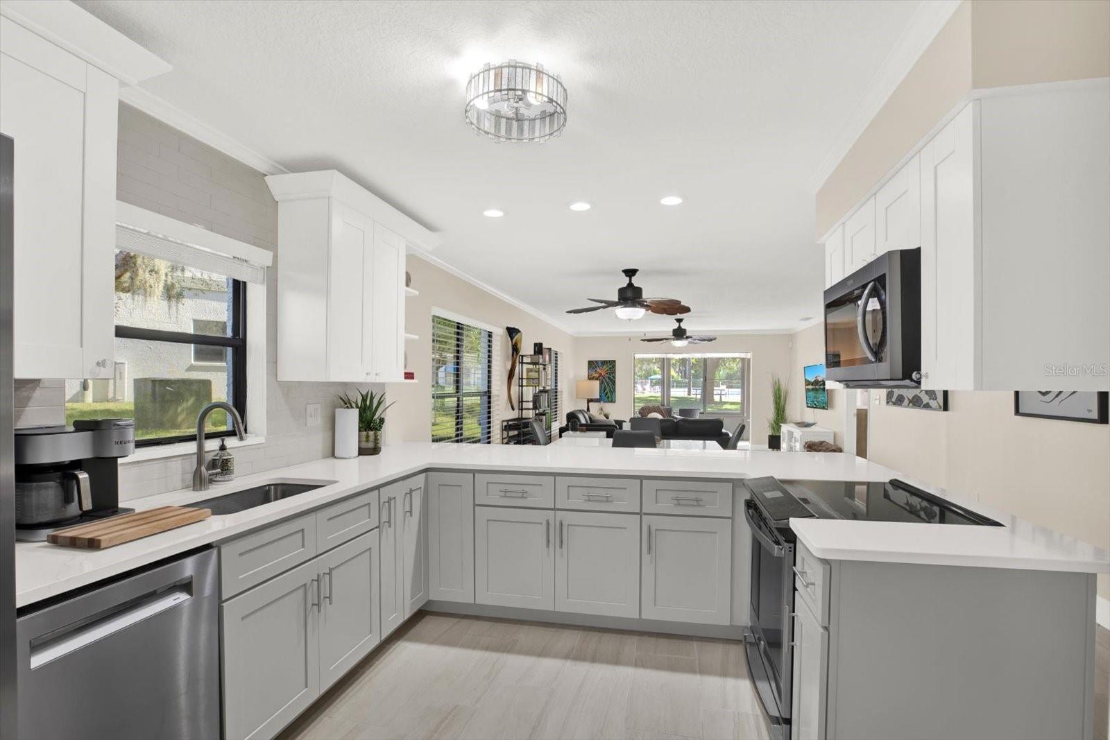 Bright, open kitchen with a seamless view into the dining and living space.
