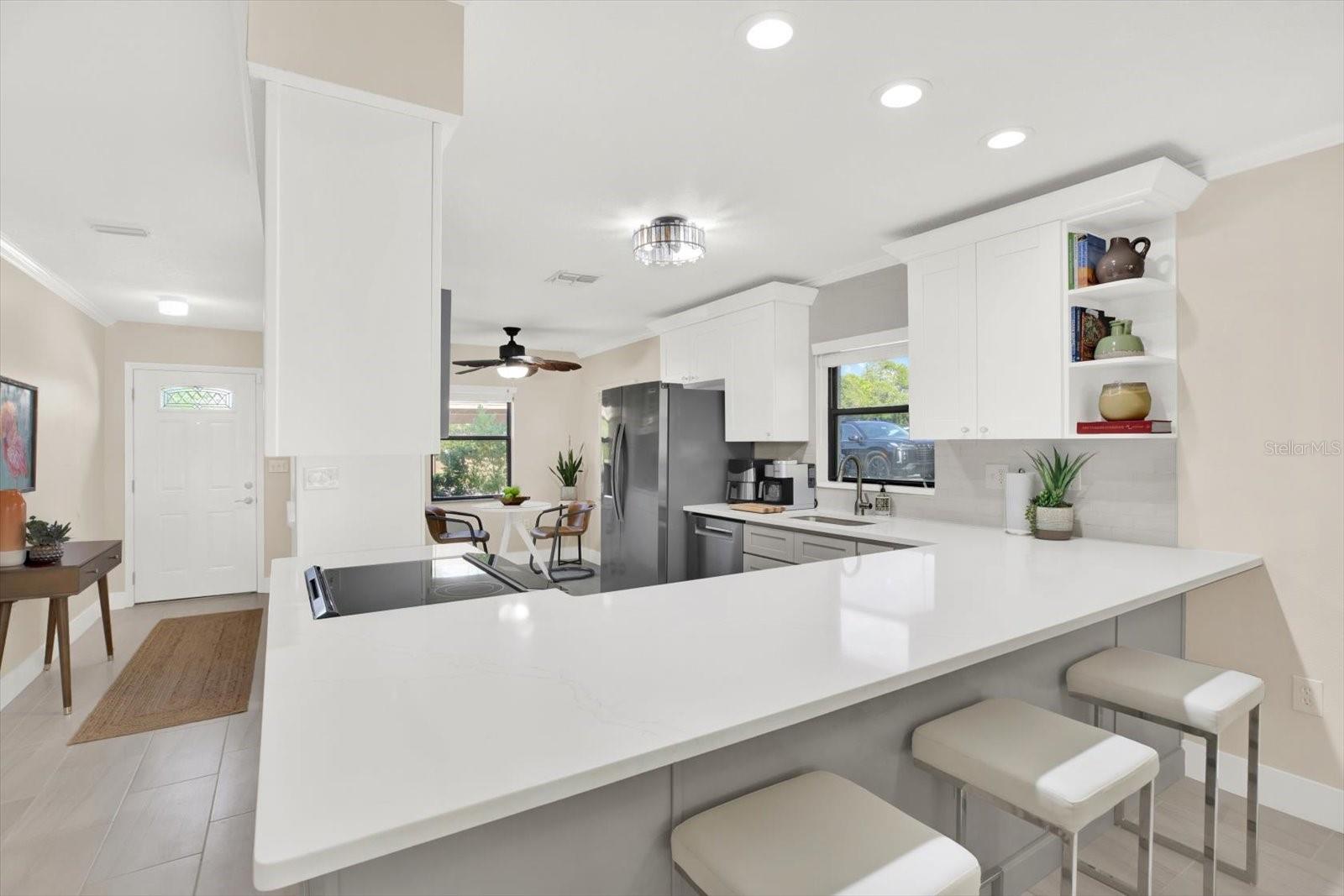 Stunning quartz counters with plenty of space for entertaining.