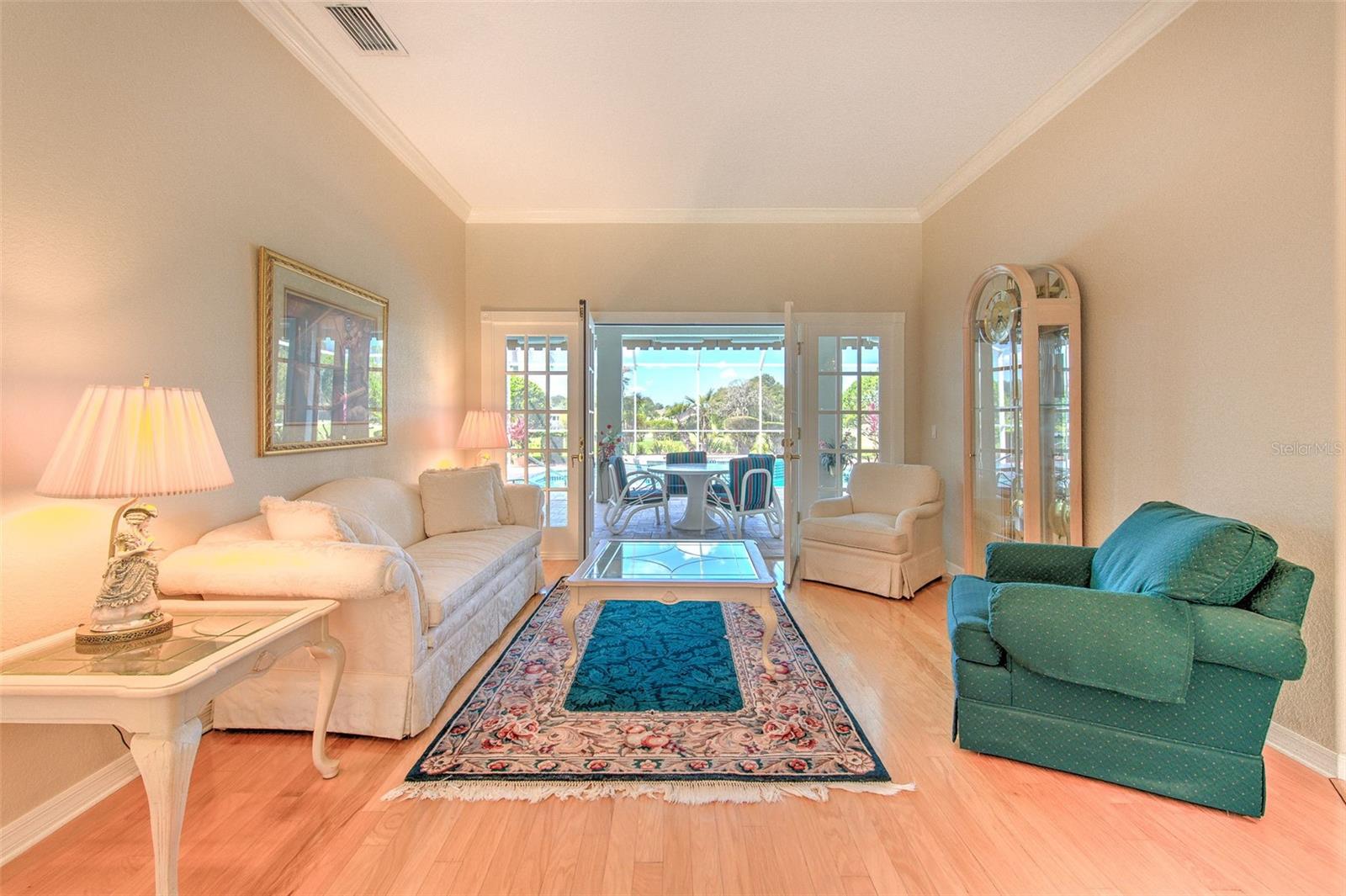 French Door flowing out to pool lanai