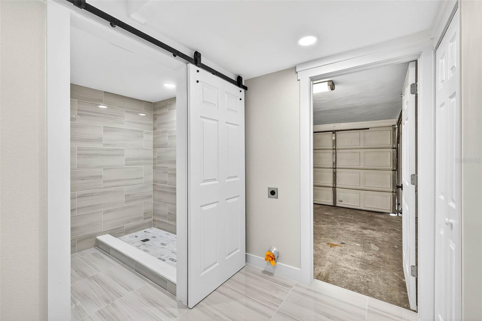 Primary Bathroom to Garage Entrance