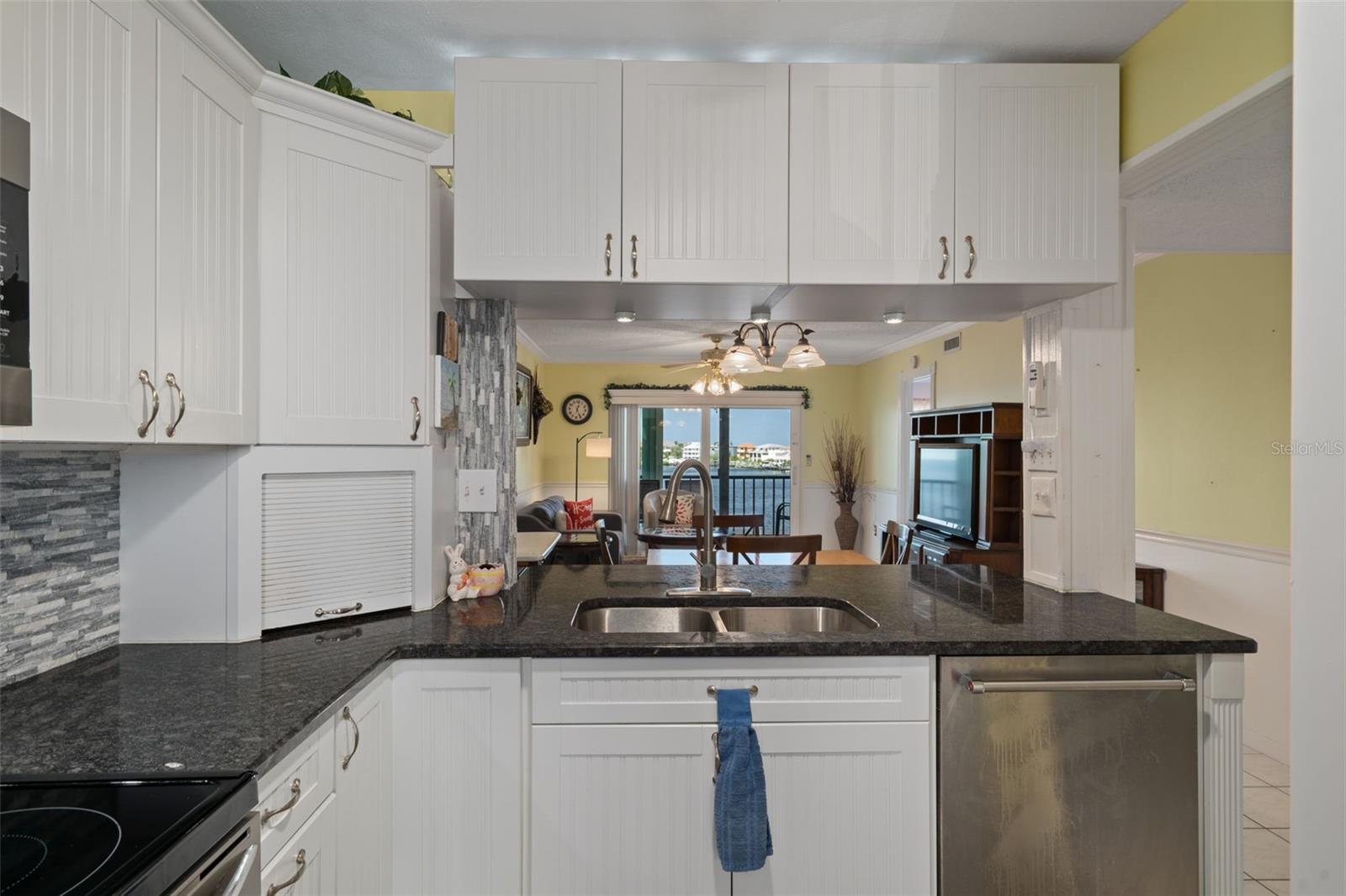 Updated kitchen with granite tops and stainless appliances