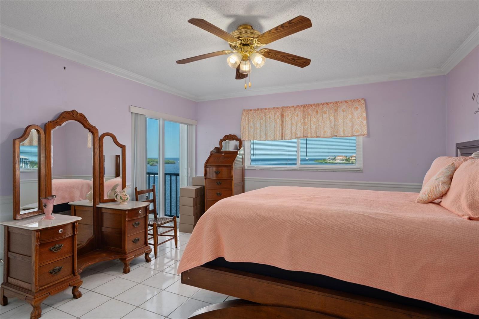 Primary Suite with access to lanai, private bath and large walk in shower. GULF FRONT VIEW