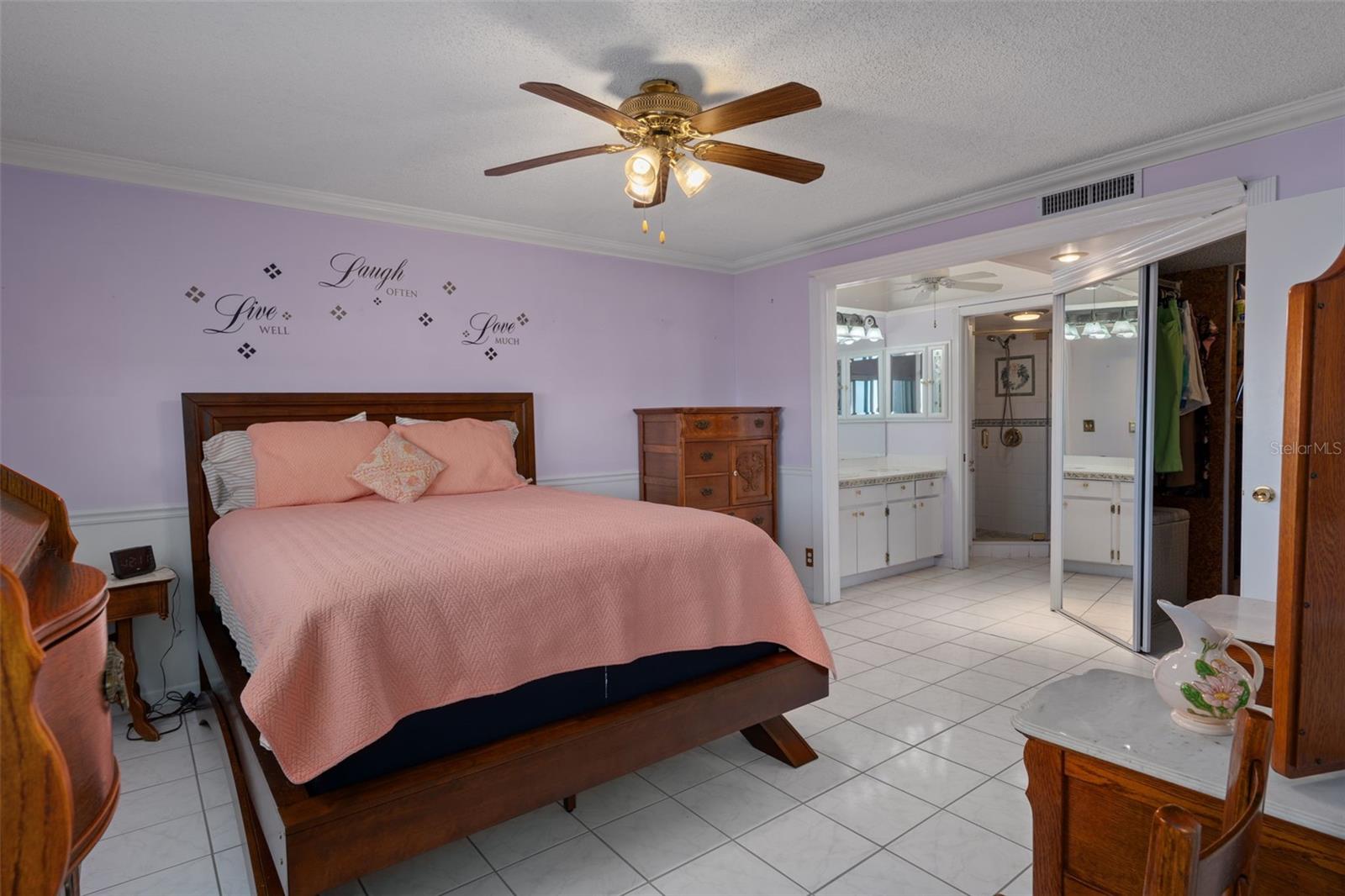 Primary Suite with access to lanai, private bath and large walk in shower. GULF FRONT VIEW