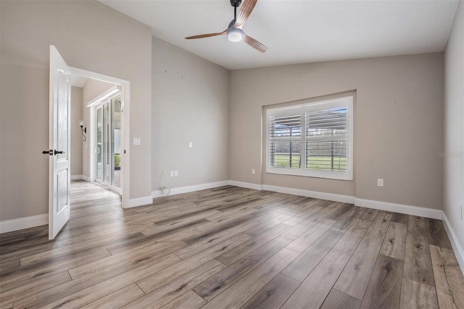 Primary bedroom with lanai view