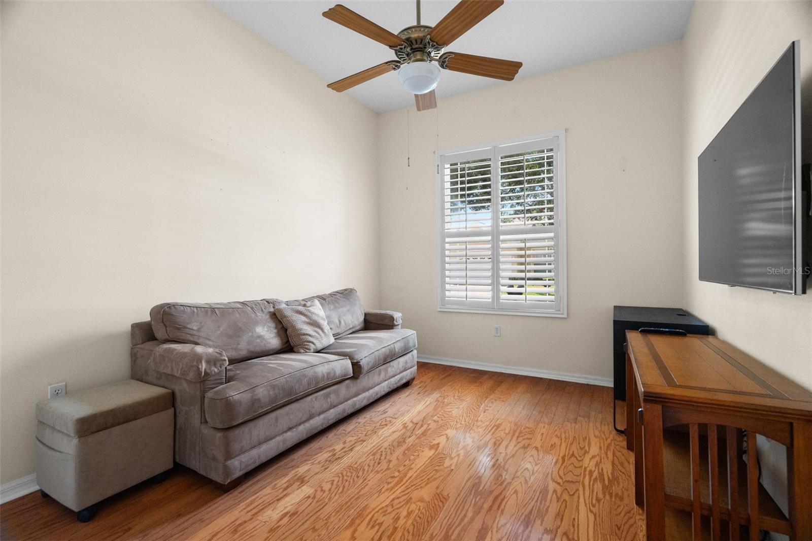 Furnished guest bedroom with sleeper sofa